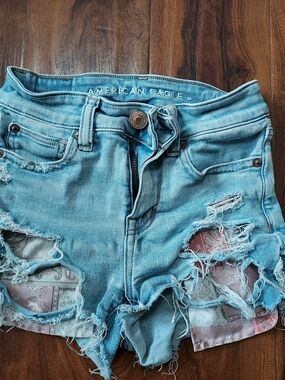 American Eagle Outfitters Light Blue Ripped Denim Shorts with Patch Underlay
